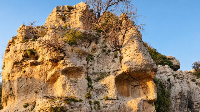 The twin limestone profiles catching the last of the evening light.